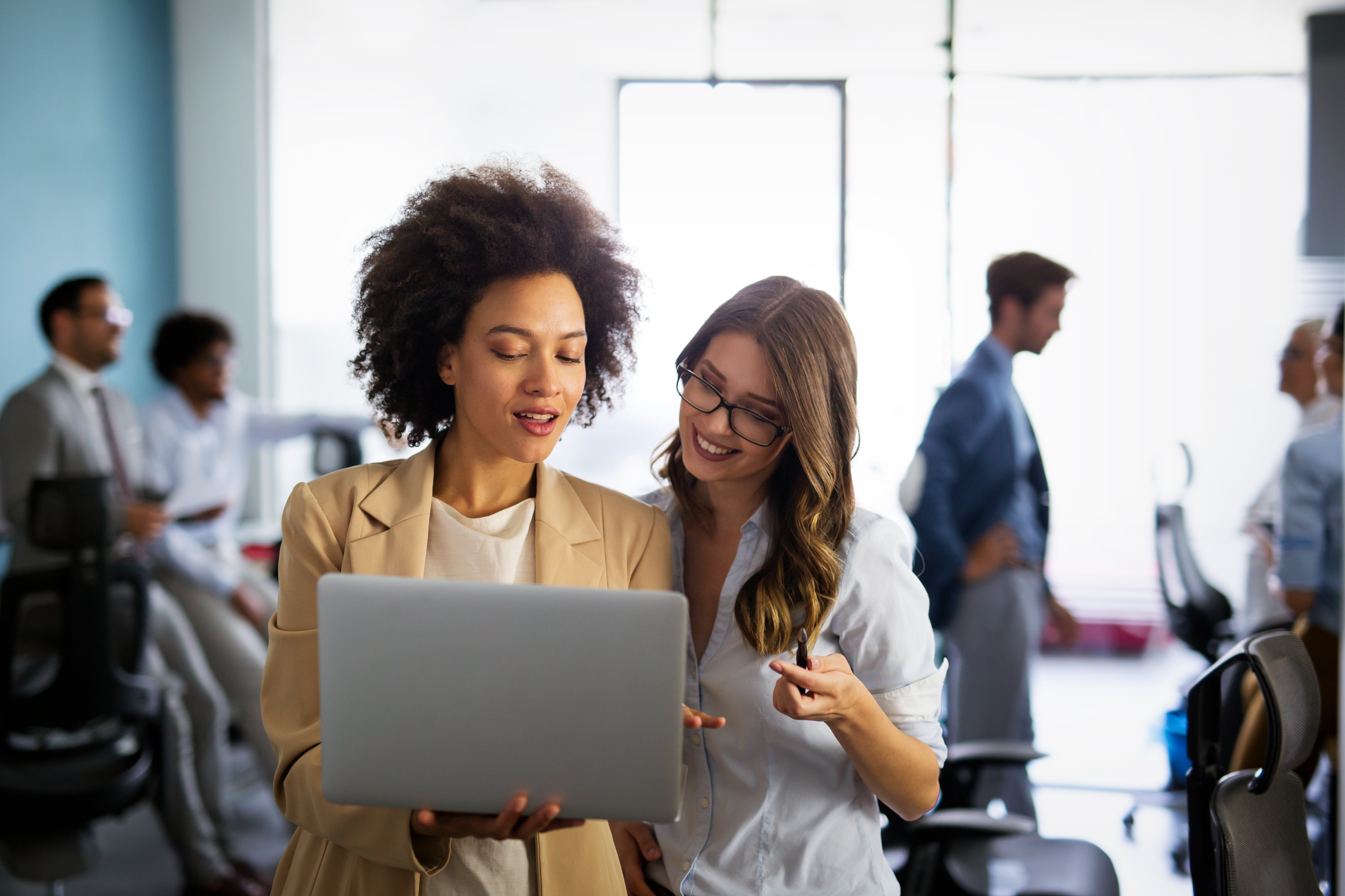 happy-multiethnic-business-women-working-together-2022-07-05-00-33-53-utc